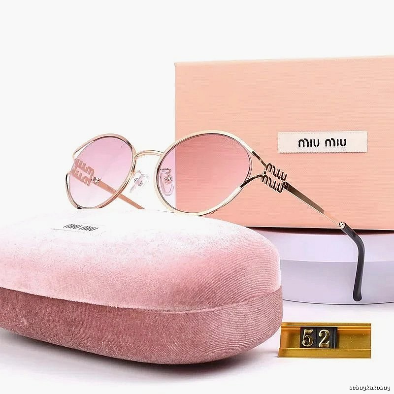 Miu Miu Statement Oversized sunglasses Black Oval Sunglasses for Easy Pairing