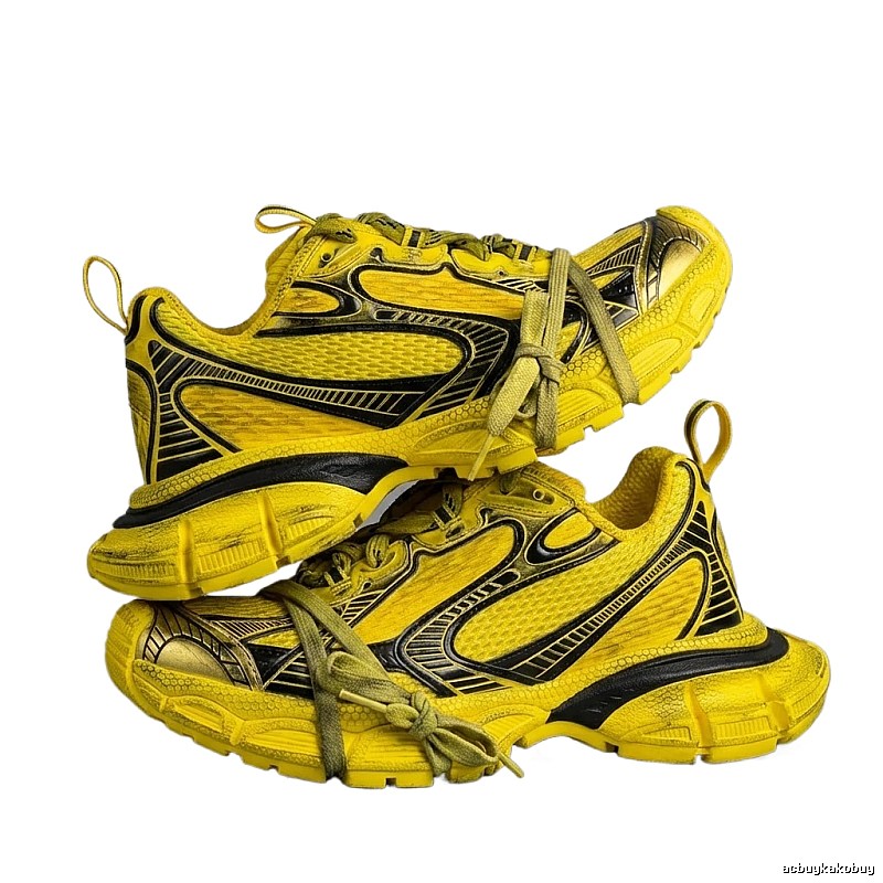 Balenciaga retro-style yellow and black sports shoes