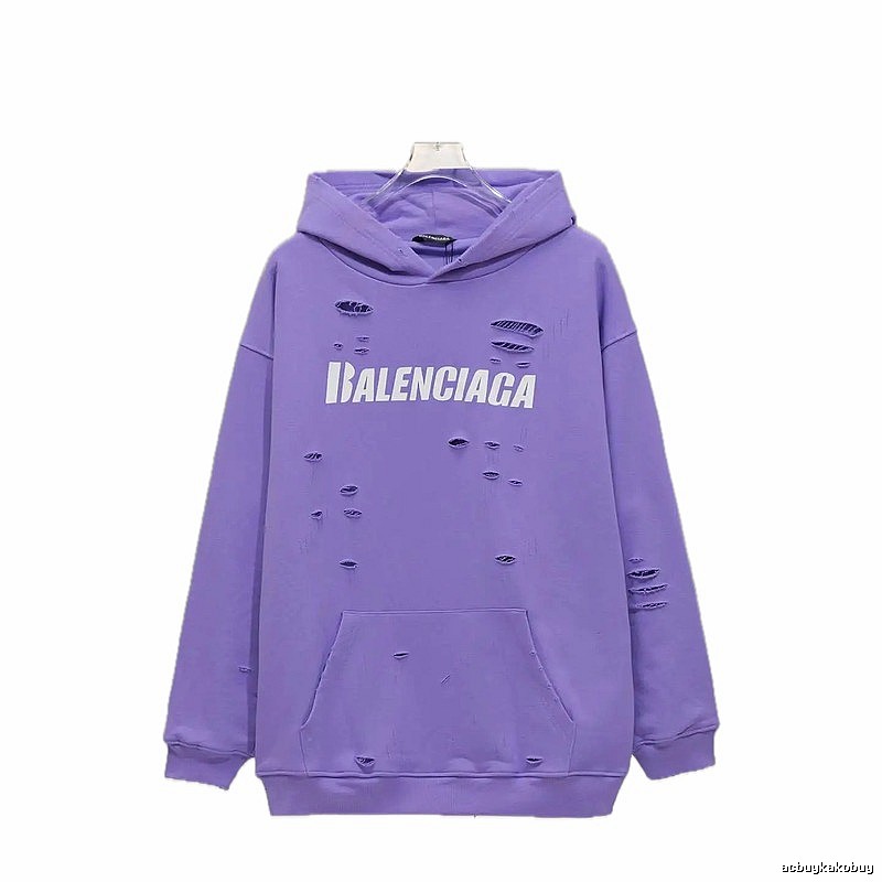 Balenciaga's ripped purple sweatshirt