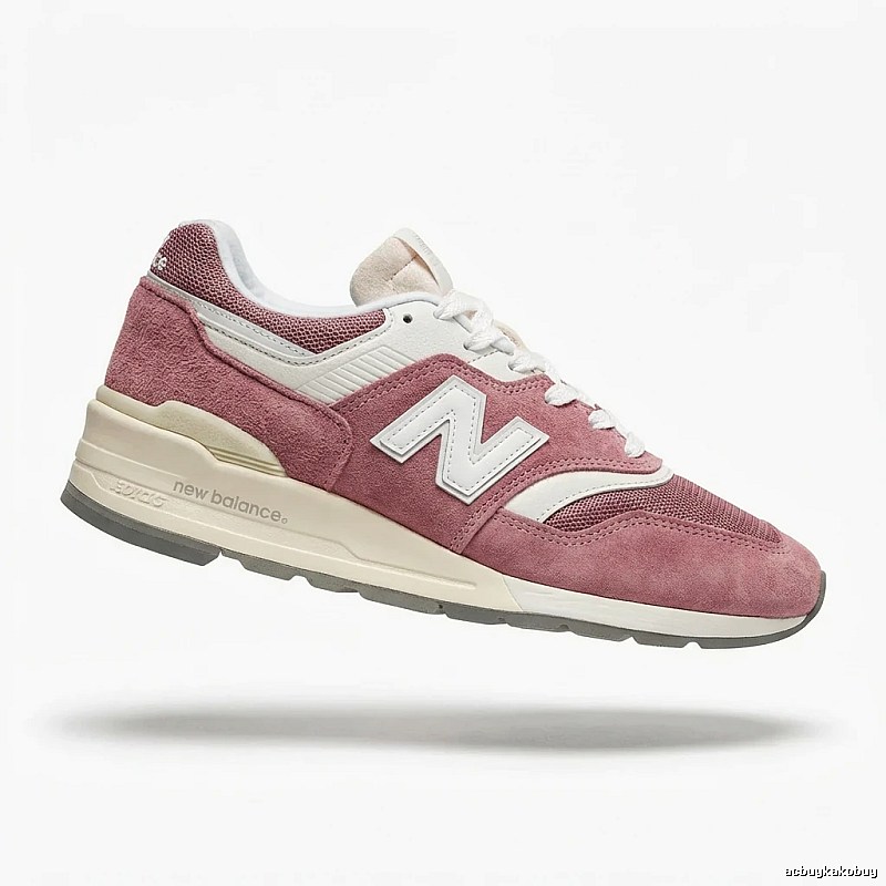 New Balance retro-style pink and white sports shoes